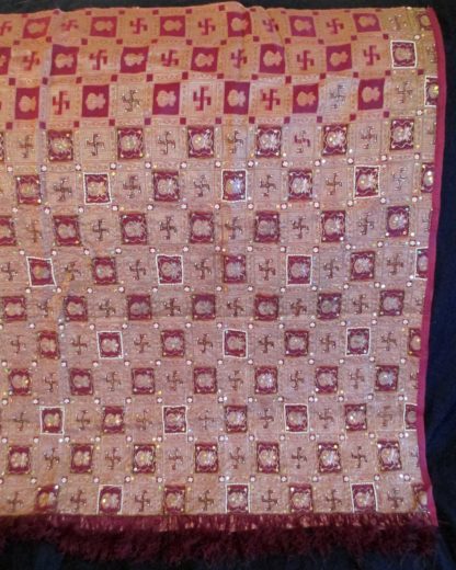 vintage sari pallu silk, woven swastikas, kalash, orangeish burgundy red & golden yellow... gold thread, gold glass & pearl beading, sequins. fringe